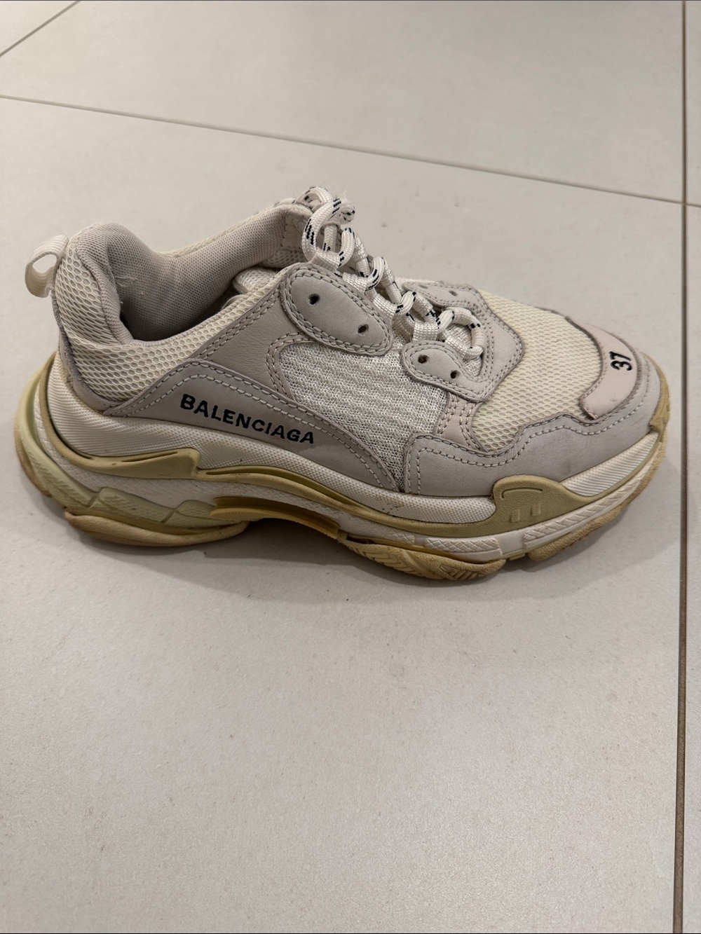 Balenciaga Women's Triple S Sneaker in Cream and Yellowed Off-White